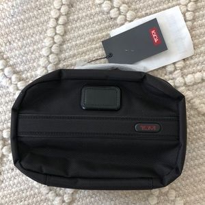 NWT Tumi split case travel kit